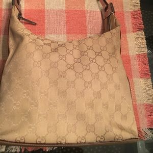 Gucci signature hobo canvas handbag
